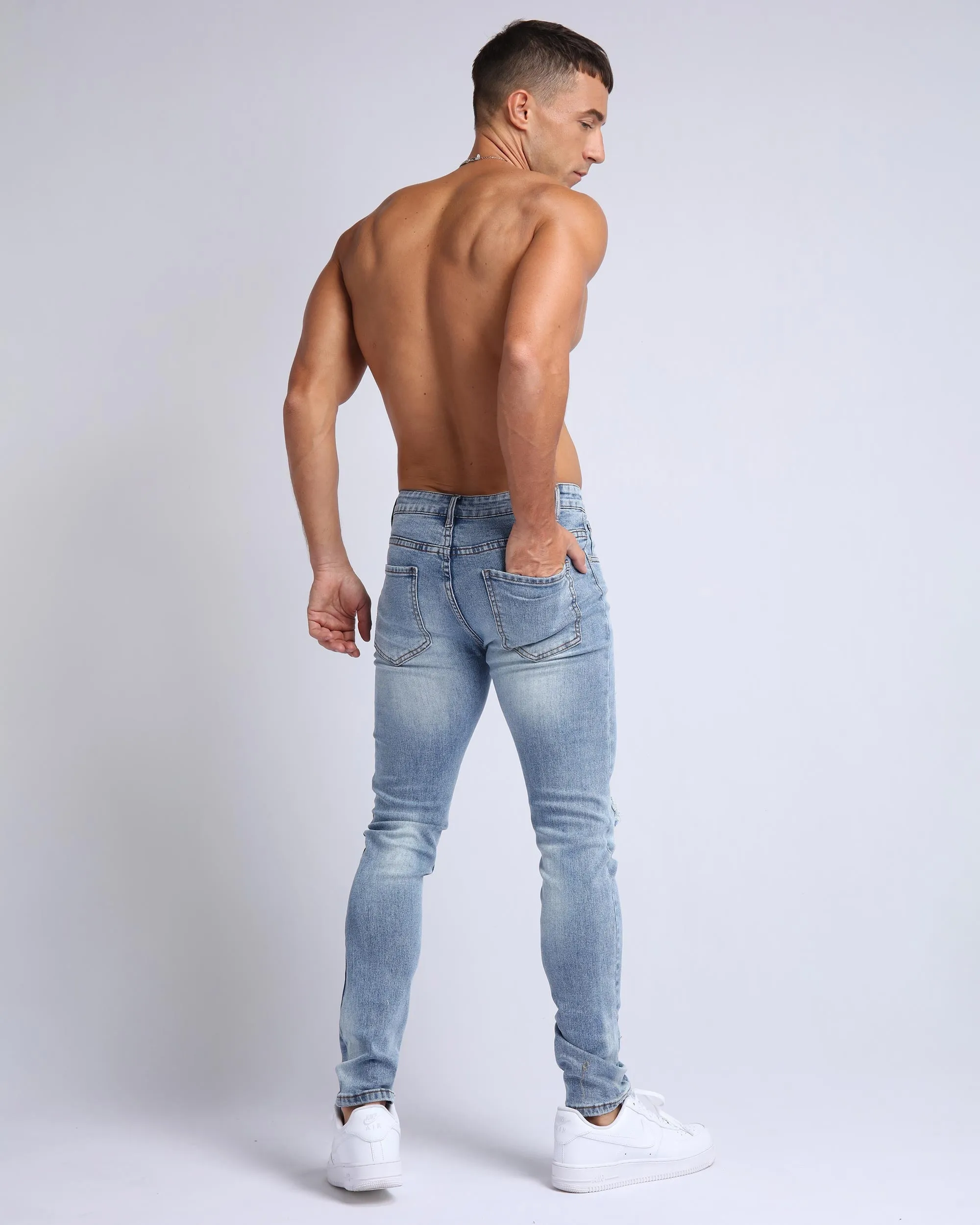 Light Wash Slim Fit Ripped Blue Jeans