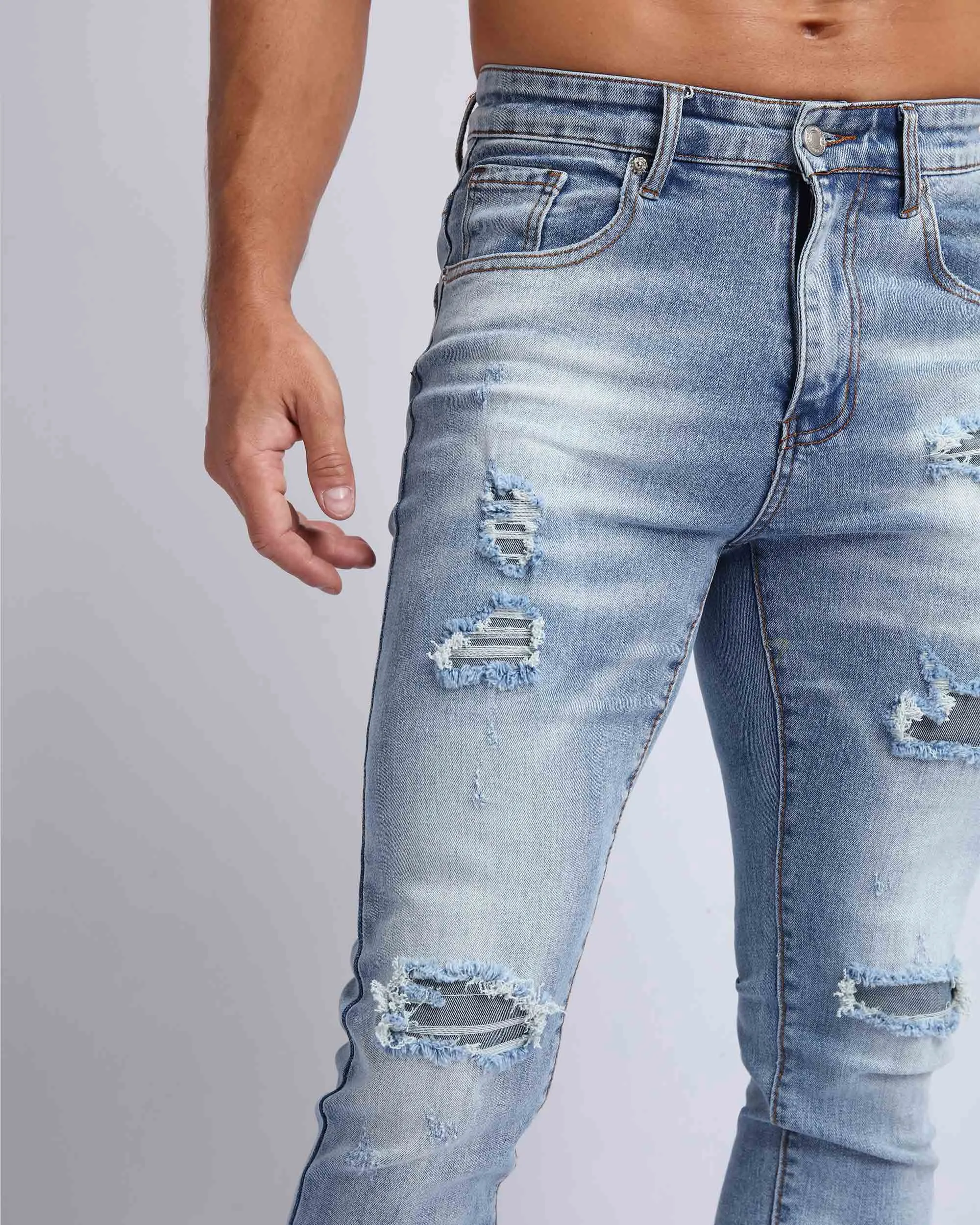 Light Wash Slim Fit Ripped Blue Jeans