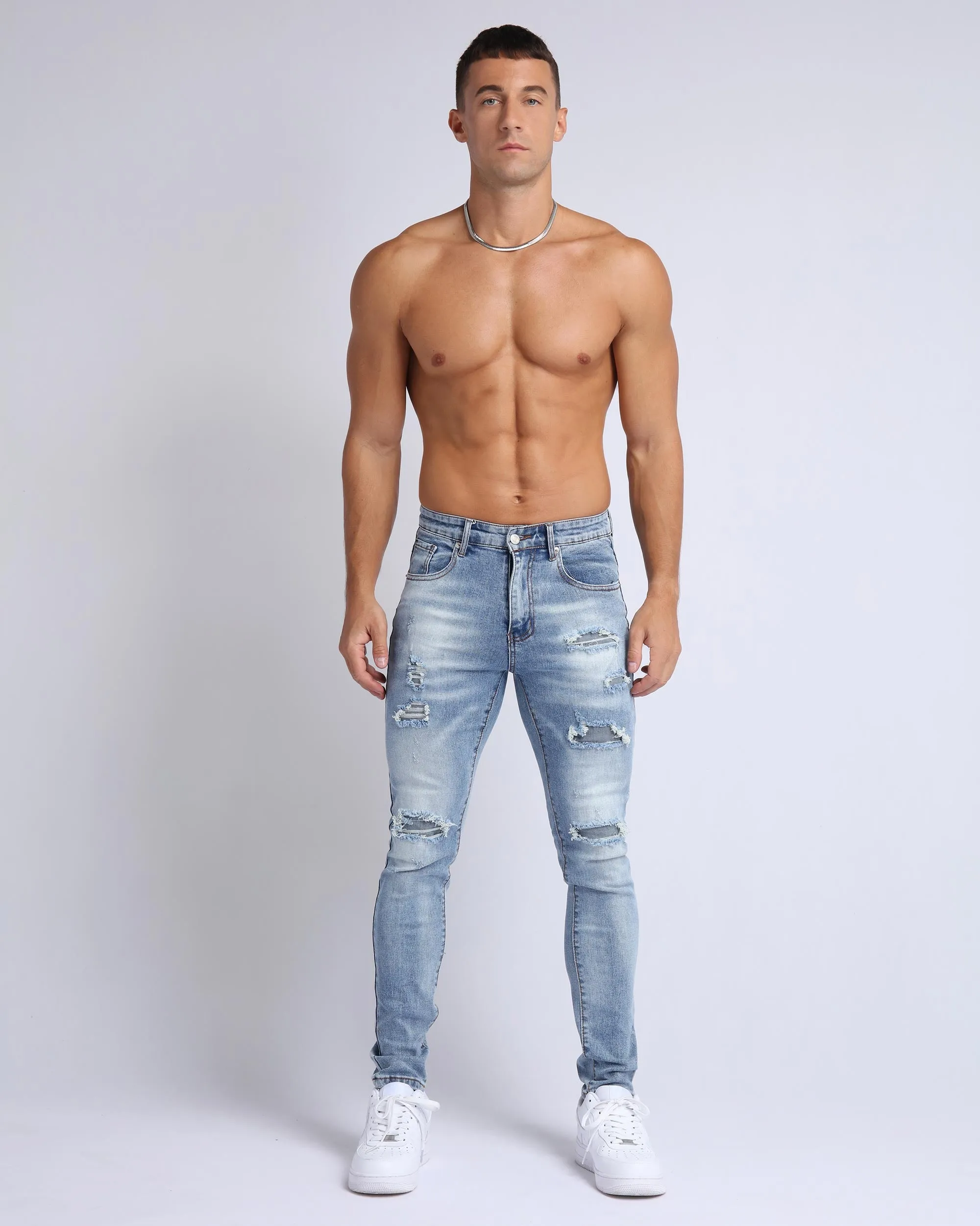 Light Wash Slim Fit Ripped Blue Jeans