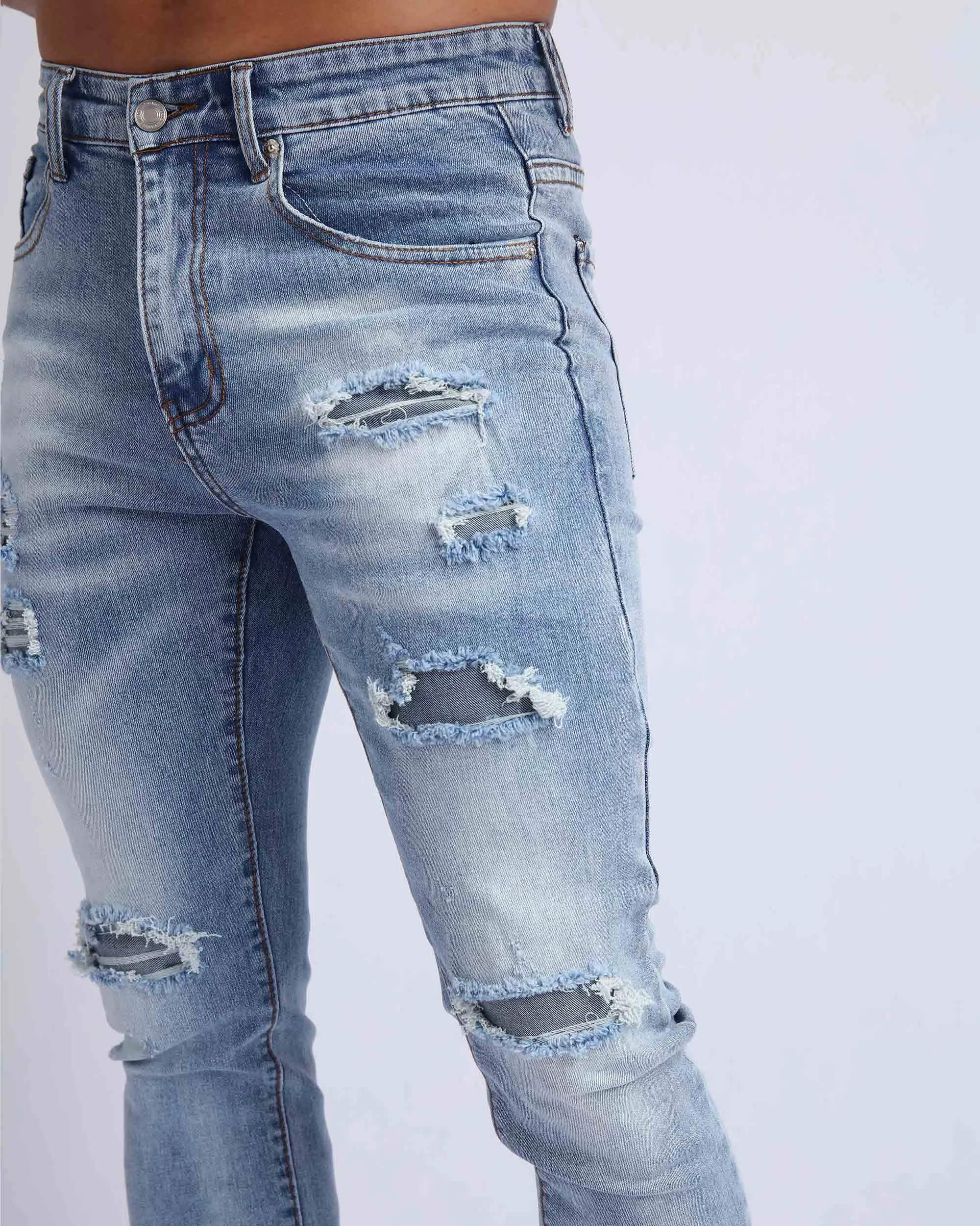 Light Wash Slim Fit Ripped Blue Jeans
