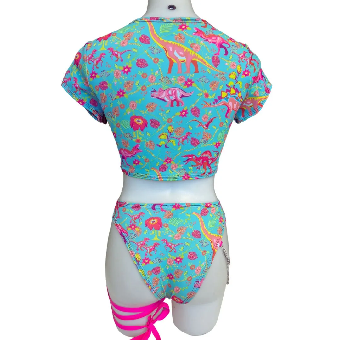 PASTEL PREHISTORIC | Baby Tee , Women's Festival Top, Rave Top | Rave Baby Tee | Baby Tee Festival | Dinosaur
