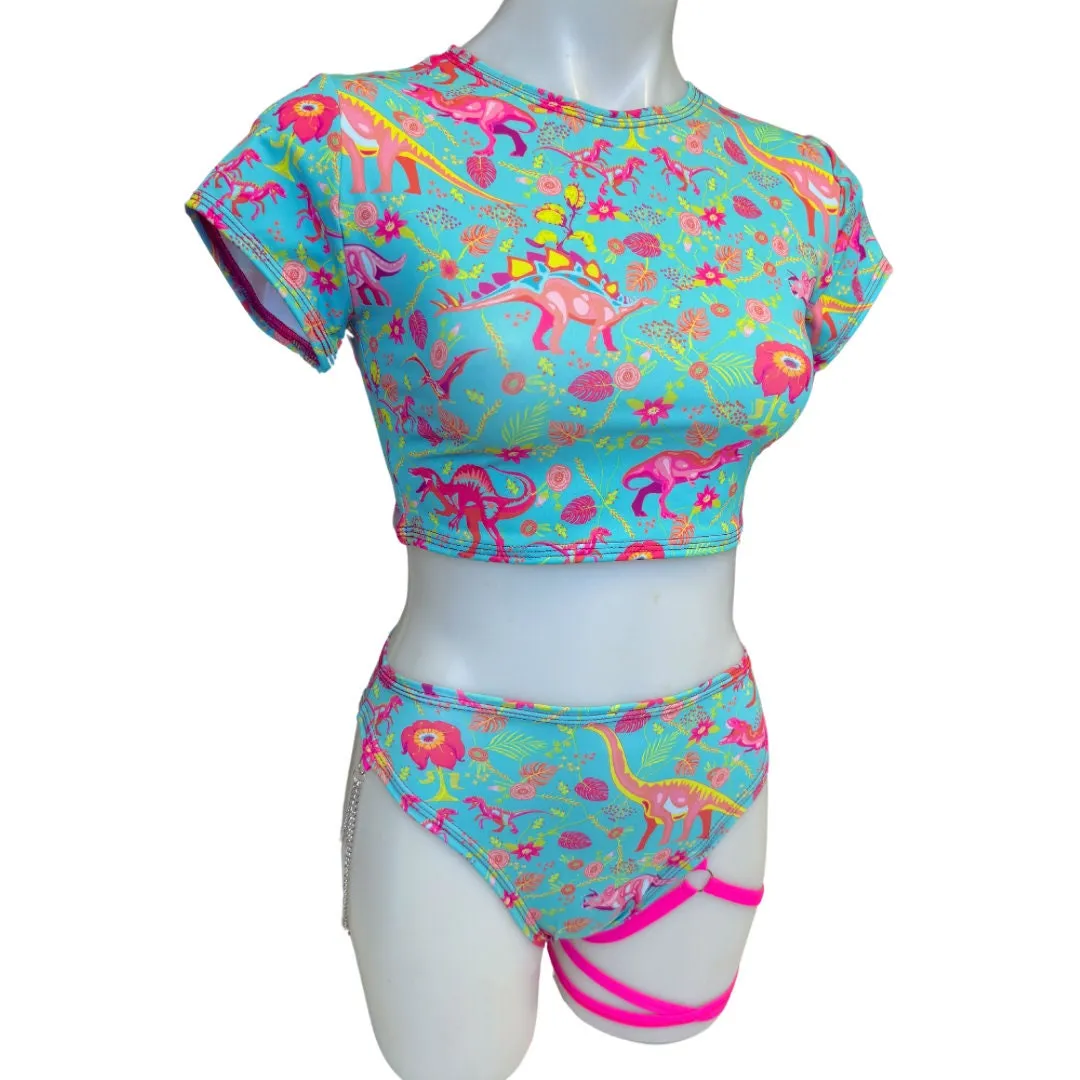 PASTEL PREHISTORIC | Baby Tee , Women's Festival Top, Rave Top | Rave Baby Tee | Baby Tee Festival | Dinosaur